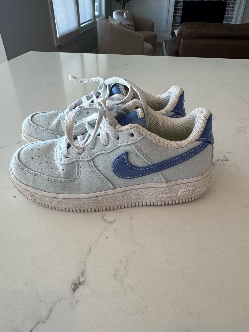 Nike Kids Light Gray Sneakers with Blue Swoosh